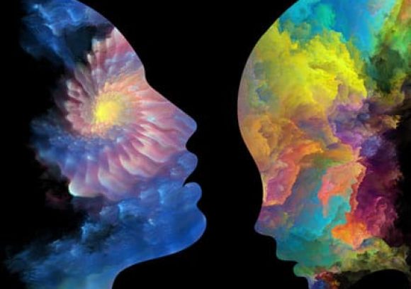 Colorful abstract faces in profile.